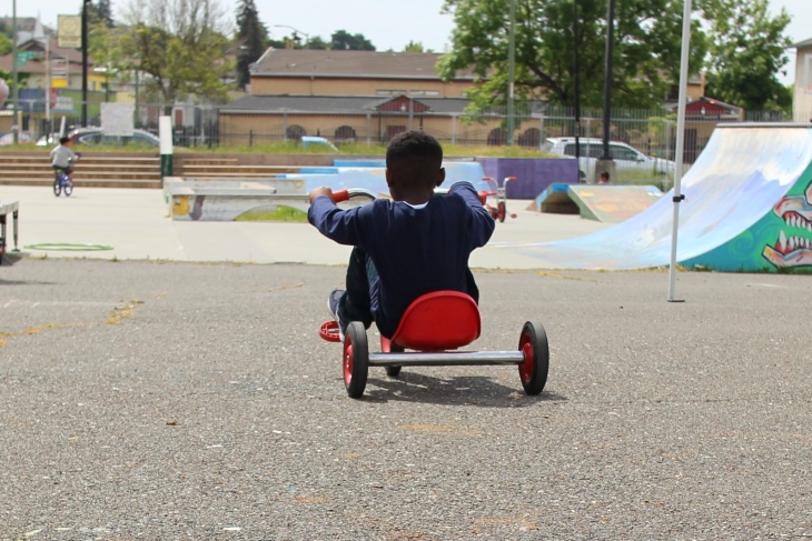 Story photo: black boy riding tricycleSacramento's Plan To Keep Black Children Alive Is Working — And LA Is Watching